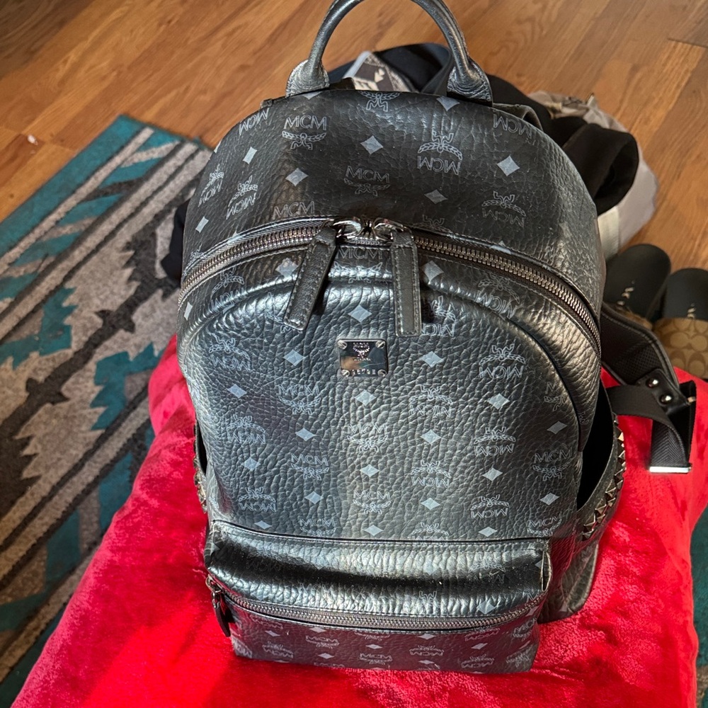 MCM Textured Black Backpack with Logo Pattern